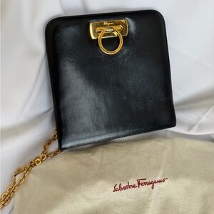 Salvatore Ferragamo Black Leather Clutch with Gold Accents
